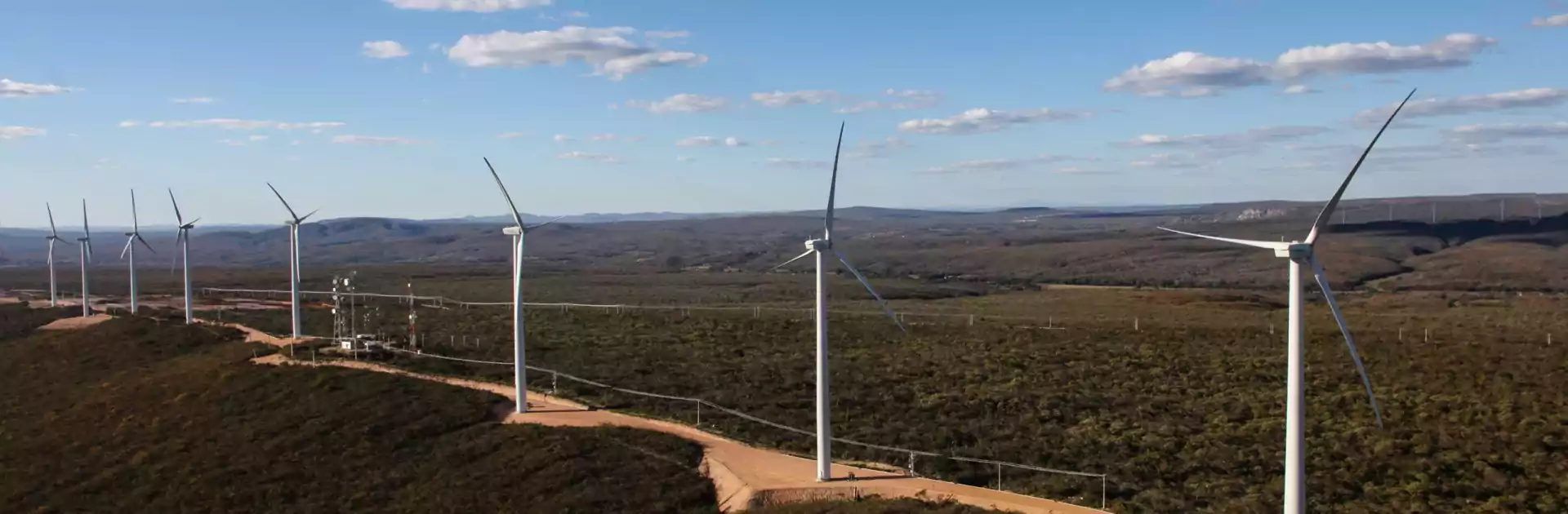 Windmills in a line on the plains.