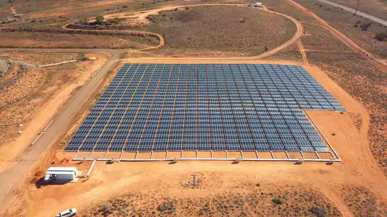tech - aerial view of solar panels and desert panama