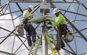 Two lineworkers