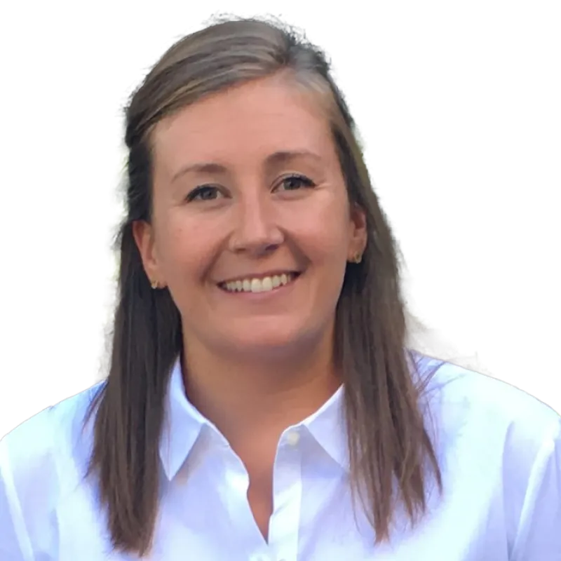 A professional headshot of a woman with long, straight, light brown hair, smiling at the camera. She is wearing a crisp white button-up shirt and has a friendly expression