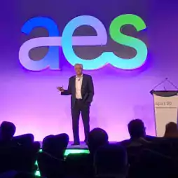 aes leader talking on stage