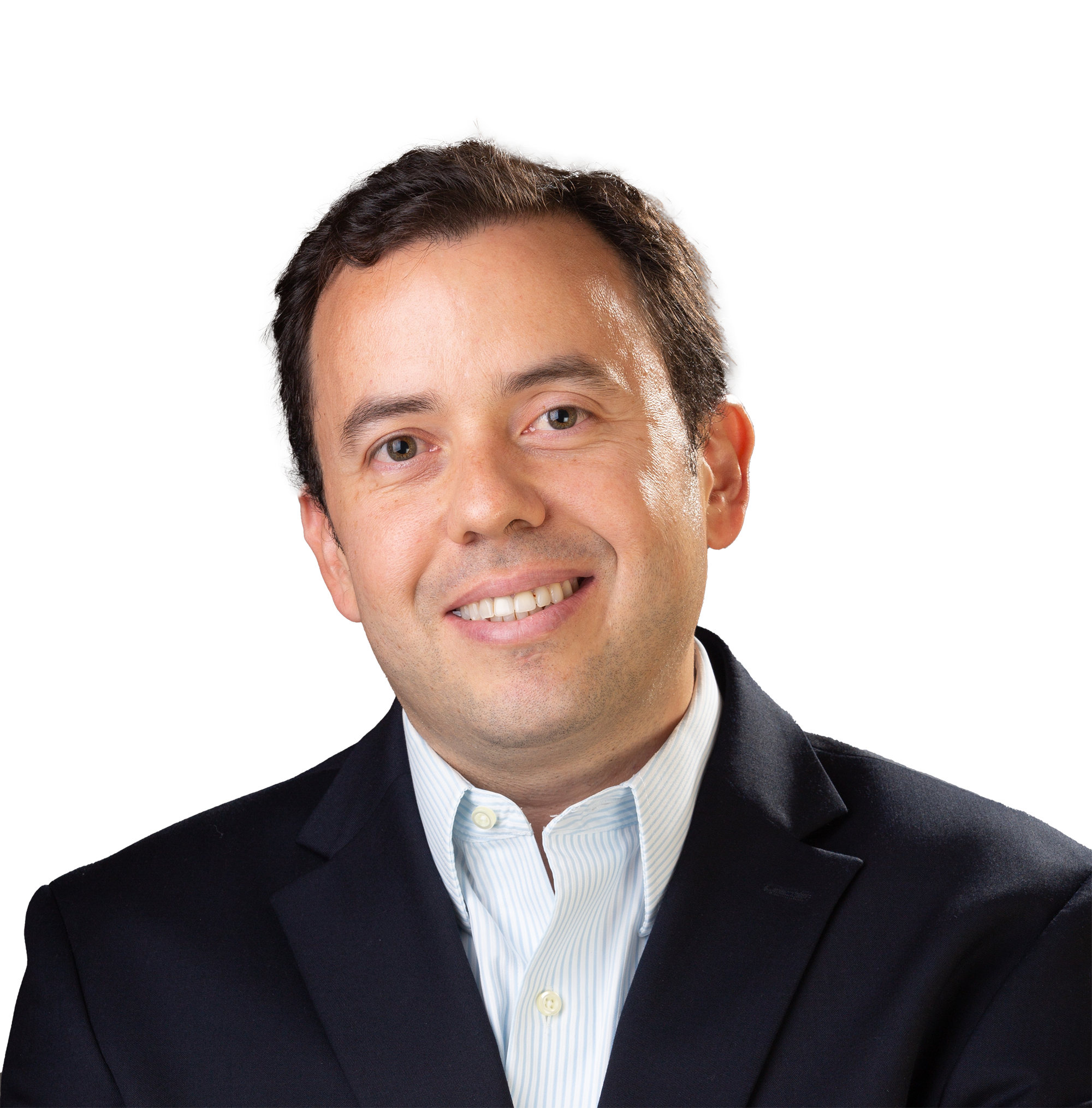 A smiling man with short dark hair, wearing a navy blue suit jacket and a light blue and white striped dress shirt.