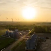 wind-turbines-and-grain-silos-at-sunset.jpg