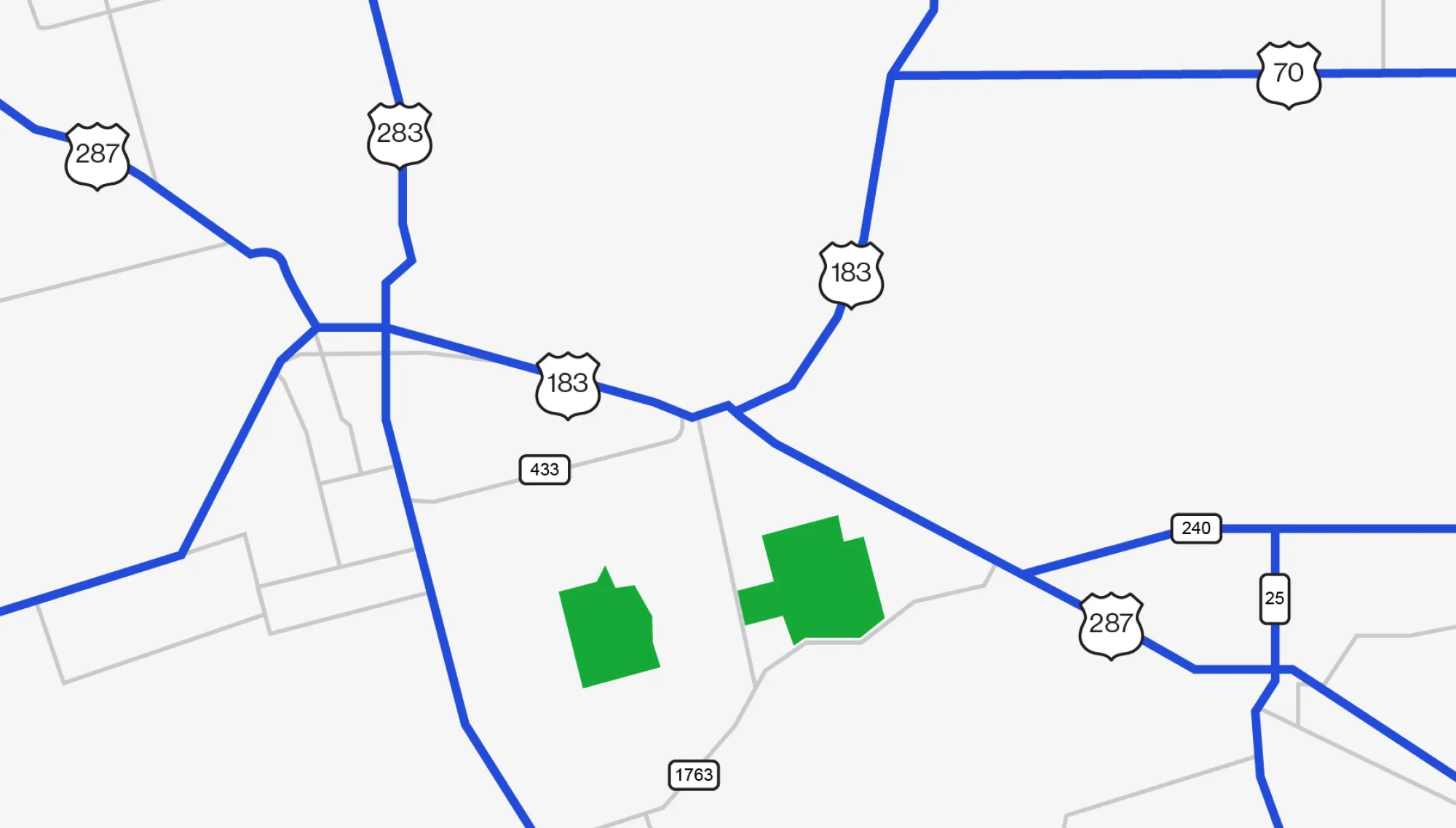 Simplified map showing major highways and roads in blue, with two green highlighted areas in the center representing the Crescent project footprint