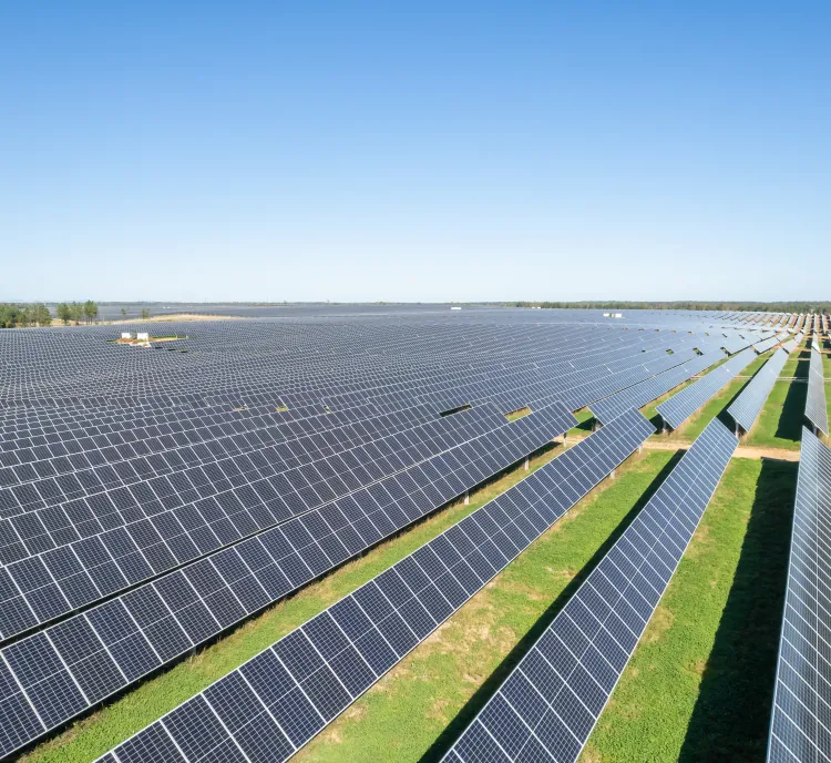 Solar facility with green grass