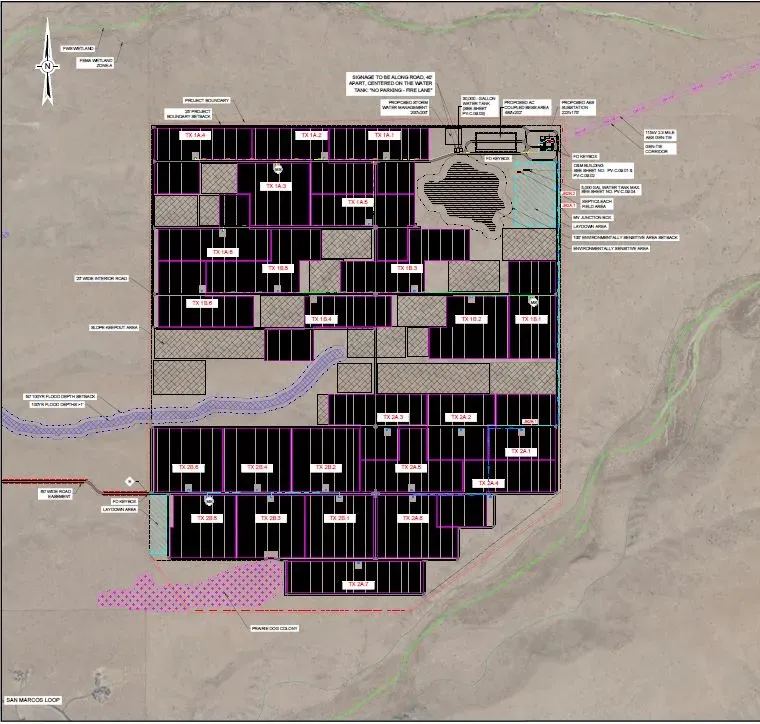 Aerial map of a solar farm layout with labeled sections and surrounding roads. The map includes various plots marked with codes, a pond area, and infrastructure details like roads and power lines. The desert landscape is visible around the solar farm.