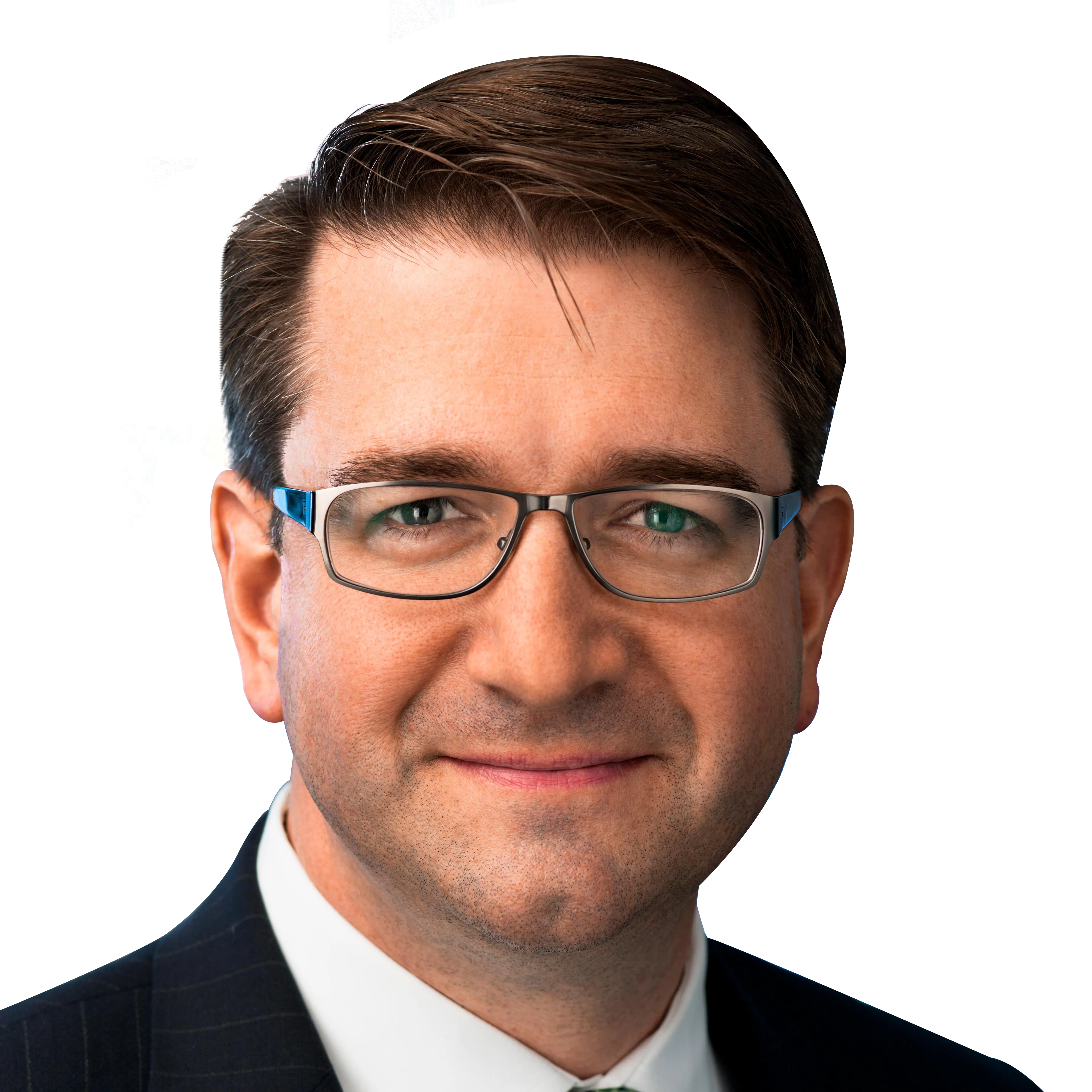Portrait of a man with glasses, wearing a suit and tie, smiling against a black background.
